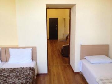 Фото номера Семейные апартаменты Апартаменты Dioskuriya Guest House г. Сухум 7