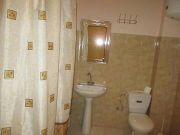 Фото номера Семейные апартаменты Апартаменты Dioskuriya Guest House г. Сухум 4