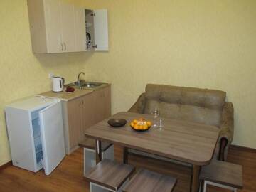 Фото номера Семейные апартаменты Апартаменты Dioskuriya Guest House г. Сухум 5