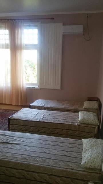 Фото номера Семейный номер с общей ванной комнатой Гостевой дом Guest House Eva г. Сухум 4