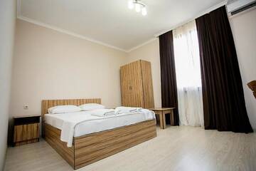 Фото номера Большой двухместный номер с 1 кроватью Отель Отель «Акуа Резорт» г. Сухум 4
