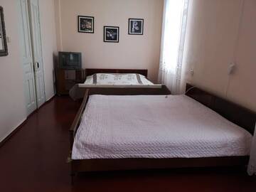 Фото номера Четырехместный номер с балконом Гостевой дом Asida Guest House г. Сухум 7