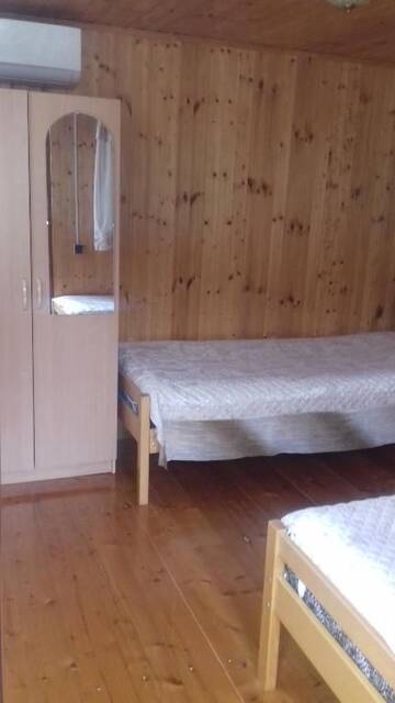 Фото номера Двухместный номер с 2 отдельными кроватями Гостевой дом Guest House Yana г. Сухум 5