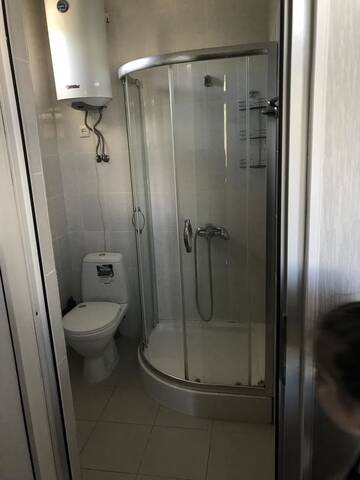 Фото номера Стандартный трехместный номер Гостевой дом Holidays In Sukhum г. Сухум 5