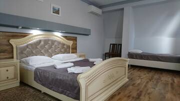 Фото номера Улучшенный двухместный номер с 1 кроватью Отель СПА Отель Каракас г. Сухум 2