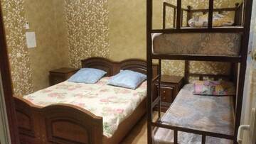 Фото номера Четырехместный номер с общей ванной комнатой Гостевой дом Алан г. Сухум 7