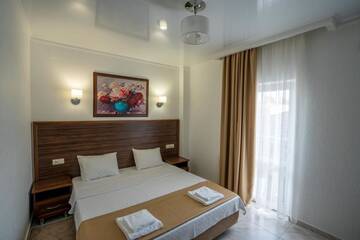 Фото номера Стандартный номер с кроватью размера  Отель Hotel Samson г. Сухум 14