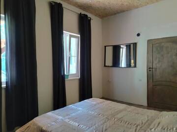 Фото номера Двухместный номер с 1 кроватью и видом на горы Гостевой дом Shivaloka г. Сухум 4