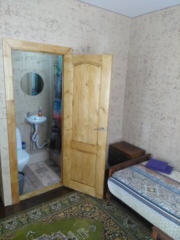 Фото номера Двухместный номер с 2 отдельными кроватями и ванной комнатой Гостевой дом Гостевой дом Ксения г. Сухум 2